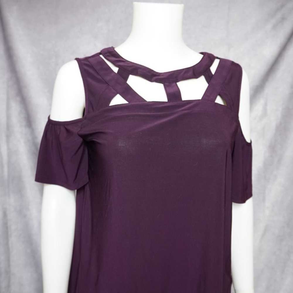 Dark purple flowy top with decolletage strap design